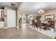 Open concept dining area with views of entryway and kitchen at 4510 Roundup Dr, Polk City, FL 33868
