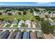 Aerial view showing a single-Gathering home's setting in a neighborhood at 6250 Sandpipers Dr, Lakeland, FL 33809