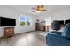 Spacious bedroom with ceiling fan, large window, and plenty of natural light at 6250 Sandpipers Dr, Lakeland, FL 33809
