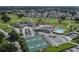 Aerial view of community center with pool, tennis, and pickleball courts at 6250 Sandpipers Dr, Lakeland, FL 33809