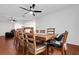 Spacious dining area with a large wooden table and six chairs at 6250 Sandpipers Dr, Lakeland, FL 33809