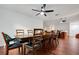 Spacious dining room with a large wooden table and six chairs at 6250 Sandpipers Dr, Lakeland, FL 33809