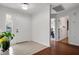 Spacious entryway with tile and wood flooring, and views into other rooms at 6250 Sandpipers Dr, Lakeland, FL 33809