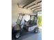 Club Car golf cart in garage at 6250 Sandpipers Dr, Lakeland, FL 33809