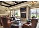 Relaxing lounge area with comfortable seating and fireplace at 6250 Sandpipers Dr, Lakeland, FL 33809