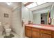 Charming bathroom with pink vanity and shower at 6256 Sandpipers Dr, Lakeland, FL 33809
