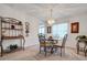 Formal dining area with a glass-top table and four chairs at 6256 Sandpipers Dr, Lakeland, FL 33809