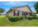 House exterior showcasing a well-maintained lawn at 6256 Sandpipers Dr, Lakeland, FL 33809