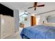 Main bedroom with ensuite bath, king bed, and walk-in closet at 6256 Sandpipers Dr, Lakeland, FL 33809
