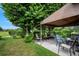 Relaxing covered patio with seating area in backyard at 6256 Sandpipers Dr, Lakeland, FL 33809