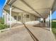 Covered carport providing shade and parking for the manufactured home at 6461 Hollyberry Ne Ln, Winter Haven, FL 33881