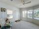 Sunroom with ample natural light, comfortable seating, and a relaxing atmosphere at 6461 Hollyberry Ne Ln, Winter Haven, FL 33881
