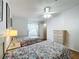 Guest bedroom with two twin beds and floral bedding at 6461 Hollyberry Ne Ln, Winter Haven, FL 33881