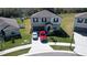 Two-story house with driveway and yard, in a residential neighborhood at 2739 Red Egret Dr, Bartow, FL 33830
