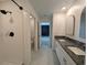 Bathroom with double vanity, granite countertops, and a shower at 2739 Red Egret Dr, Bartow, FL 33830