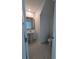 Clean bathroom with pedestal sink and tile flooring at 2739 Red Egret Dr, Bartow, FL 33830