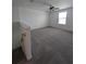 Spacious bonus room with carpeted floor and ceiling fan at 2739 Red Egret Dr, Bartow, FL 33830