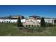 Community entrance sign for Wind Meadows Townhomes at 2739 Red Egret Dr, Bartow, FL 33830