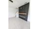 Modern electric fireplace with a sleek black surround at 2739 Red Egret Dr, Bartow, FL 33830