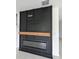 Modern electric fireplace with a sleek black surround at 2739 Red Egret Dr, Bartow, FL 33830