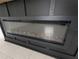 Close-up of modern electric fireplace with realistic flame effect at 2739 Red Egret Dr, Bartow, FL 33830