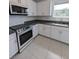 Modern kitchen featuring stainless steel appliances and granite countertops at 2739 Red Egret Dr, Bartow, FL 33830