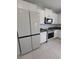 Sleek kitchen with stainless steel appliances and modern cabinetry at 2739 Red Egret Dr, Bartow, FL 33830