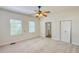 Bright bedroom with ceiling fan and ample space at 285 Lemon St, Mulberry, FL 33860