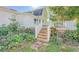 Deck with stairs leading down to yard at 285 Lemon St, Mulberry, FL 33860