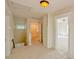 Upstairs hallway with access to bathroom and bedroom at 285 Lemon St, Mulberry, FL 33860