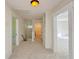 Upstairs hallway with access to bathroom and bedrooms at 285 Lemon St, Mulberry, FL 33860