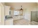 Well-equipped kitchen featuring white cabinets and granite countertops at 285 Lemon St, Mulberry, FL 33860