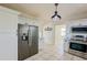 Modern kitchen with stainless steel appliances and white cabinets at 285 Lemon St, Mulberry, FL 33860