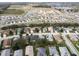 Aerial view of a residential area with various house styles and landscaping at 4197 Cannes Ave, Lake Wales, FL 33859