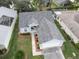One-story house with grey roof and attached garage at 4197 Cannes Ave, Lake Wales, FL 33859