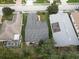 One-story house with grey roof and attached garage at 4197 Cannes Ave, Lake Wales, FL 33859