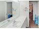 Clean bathroom with double vanity and large mirror at 4197 Cannes Ave, Lake Wales, FL 33859