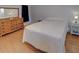 Bedroom with ceiling fan and wooden dresser at 4197 Cannes Ave, Lake Wales, FL 33859