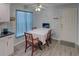 Small dining area with table and chairs near kitchen at 4197 Cannes Ave, Lake Wales, FL 33859