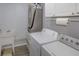 Laundry room with washer, dryer and utility sink at 4197 Cannes Ave, Lake Wales, FL 33859