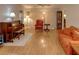 Living room with hardwood floors, piano, and comfortable seating at 4197 Cannes Ave, Lake Wales, FL 33859