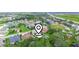 Aerial view showing home's location in a quiet residential neighborhood at 4511 Micanope Crescent Dr, Lakeland, FL 33811