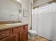 Bathroom with shower/tub combo and updated vanity at 4511 Micanope Crescent Dr, Lakeland, FL 33811