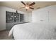 Bedroom with built-in shelving and a comfortable bed at 4511 Micanope Crescent Dr, Lakeland, FL 33811