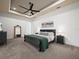 Spacious Primary bedroom with a king-size bed and plenty of natural light at 4511 Micanope Crescent Dr, Lakeland, FL 33811