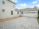 House exterior with paver driveway and garage at 4511 Micanope Crescent Dr, Lakeland, FL 33811