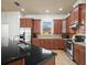 Modern kitchen with stainless steel appliances and granite countertops at 4511 Micanope Crescent Dr, Lakeland, FL 33811