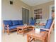 Relaxing patio furnished with wooden seating at 4511 Micanope Crescent Dr, Lakeland, FL 33811