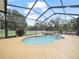 Inviting kidney-shaped pool with screened enclosure at 4511 Micanope Crescent Dr, Lakeland, FL 33811