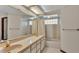 Clean bathroom with double sinks, tub, and shower at 4616 Musket Dr, Lakeland, FL 33810